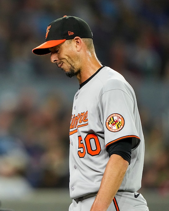 TORONTO, CANADA - MARCH 28: Charlie Morton #50 of the Baltimore Orioles reacts after being pulled from the game in the fourth inning against the Toronto Blue Jays at Rogers Centre on March 28, 2025 in Toronto, Canada.
