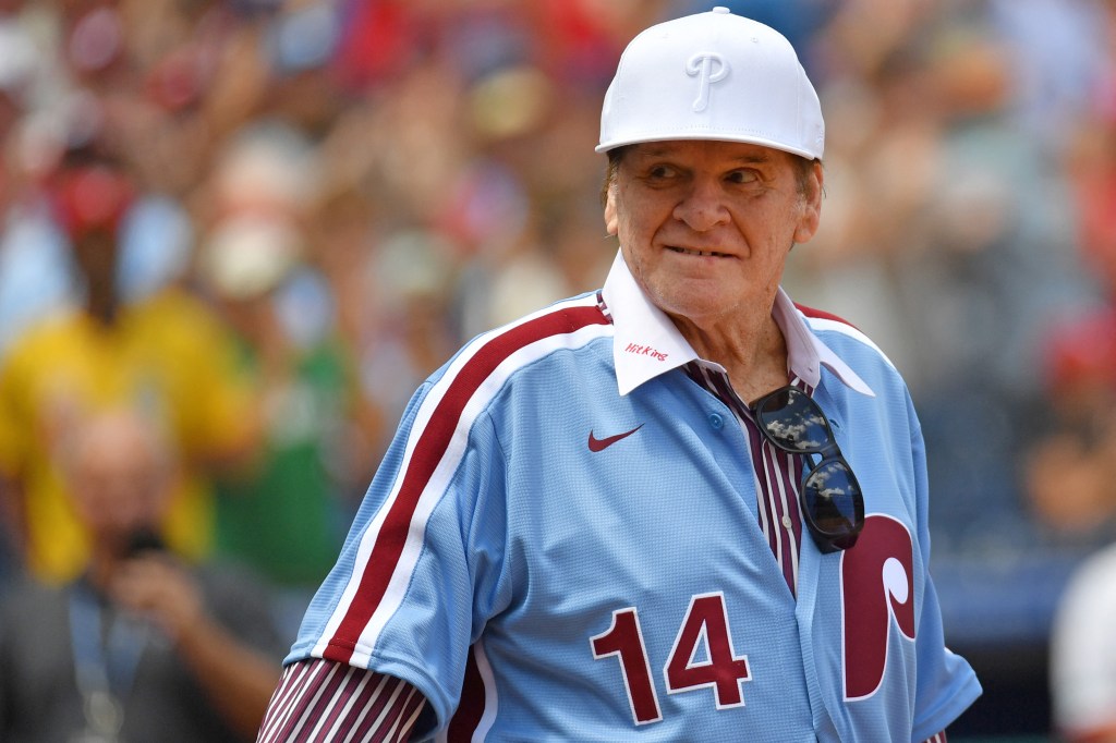 Former Philadelphia Phillies great Pete Rose acknowledges the crowd during Alumni Day ceremony before game against the Washington Nationals at Citizens Bank Park.
