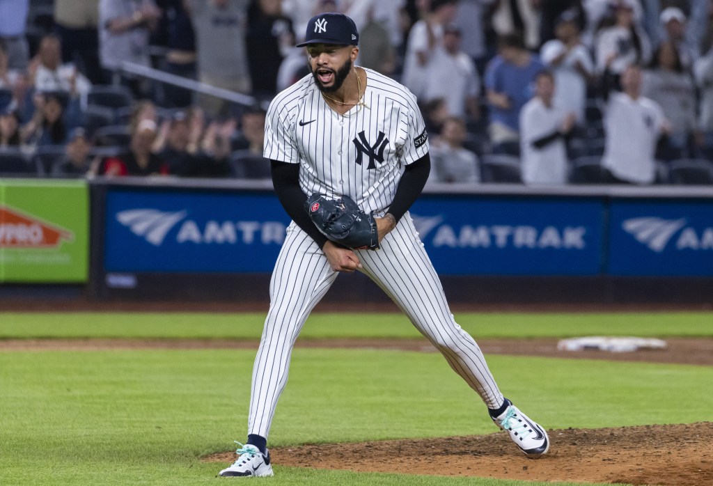 Devin Williams celebrates after escaping a 10th inning jam in the Yankees' 4-3 comeback win over the Padres on May 7, 2025.