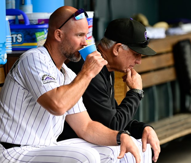 Colorado Rockies third base coach/infield coach Warren Schaeffer (34), left, and manager Bud Black in the dugout before the game against the Atlanta Braves at Coors Field in Denver on Wednesday, April 30, 2025. (Photo by Andy Cross/The Denver Post)