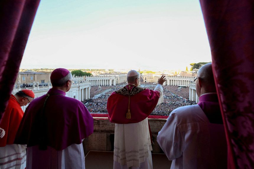 Newly elected Pope Leo XIV, formerly Cardinal Robert Francis Prevost, waves from the balcony of St. Peter's Basilica at the Vatican after his election by the papal conclave as leader of the Roman Catholic Church on Thursday.