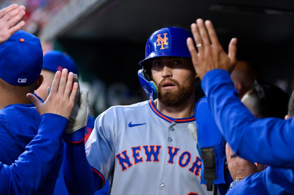 Brandon Nimmo reacts after scoring during the Mets' game against the Cardinals on May 2.