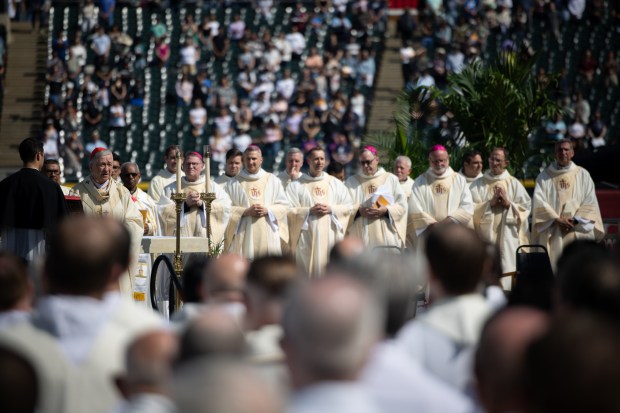 Cardinal Blase Cupich leads the beginning of a Catholic Mass begins while celebrating the election of Pope Leo XIV with a citywide gathering at Rate Field on June 14, 2025. (Audrey Richardson/Chicago Tribune)