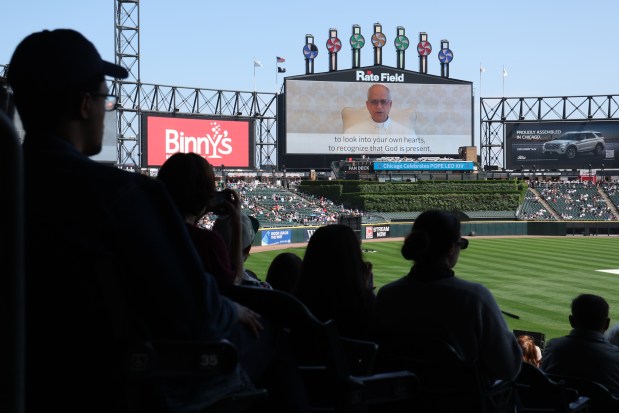 On a video feed, Pope Leo XIV, speaks to the people before a Mass at Rate Field on June 14th, 2025. (Antonio Perez/Chicago Tribune)