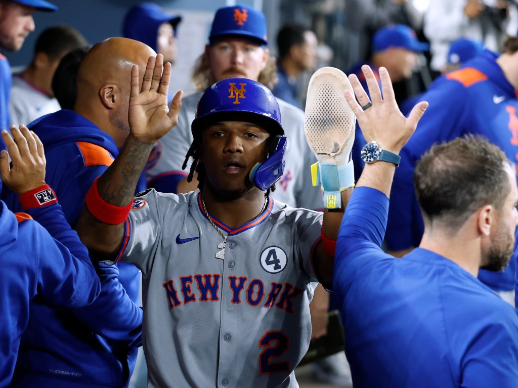 Luisangel Acuña celebrates after scoring a run in the Mets' win over the Dodger on June 2, 2025.
